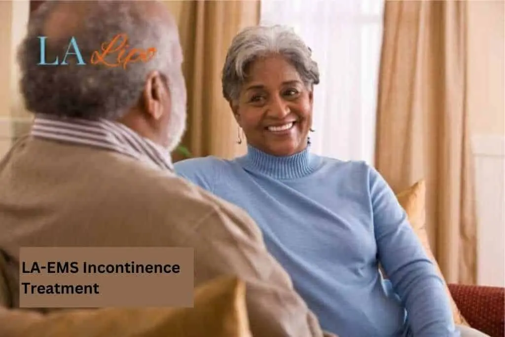 Couple sat smiling at each other - LA-EMS treatment Welford-on-Avon